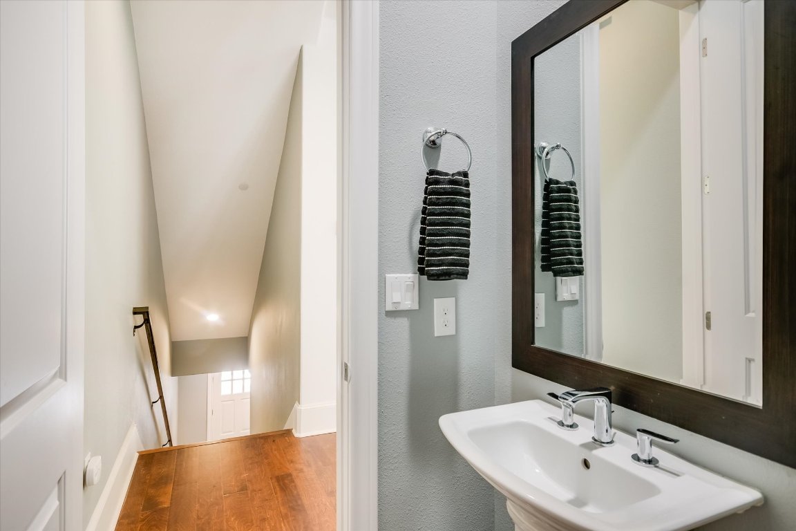 1023 Juniper Street Austin, TX 78702 - Photo 11 of 31 a bathroom with a sink and a mirror