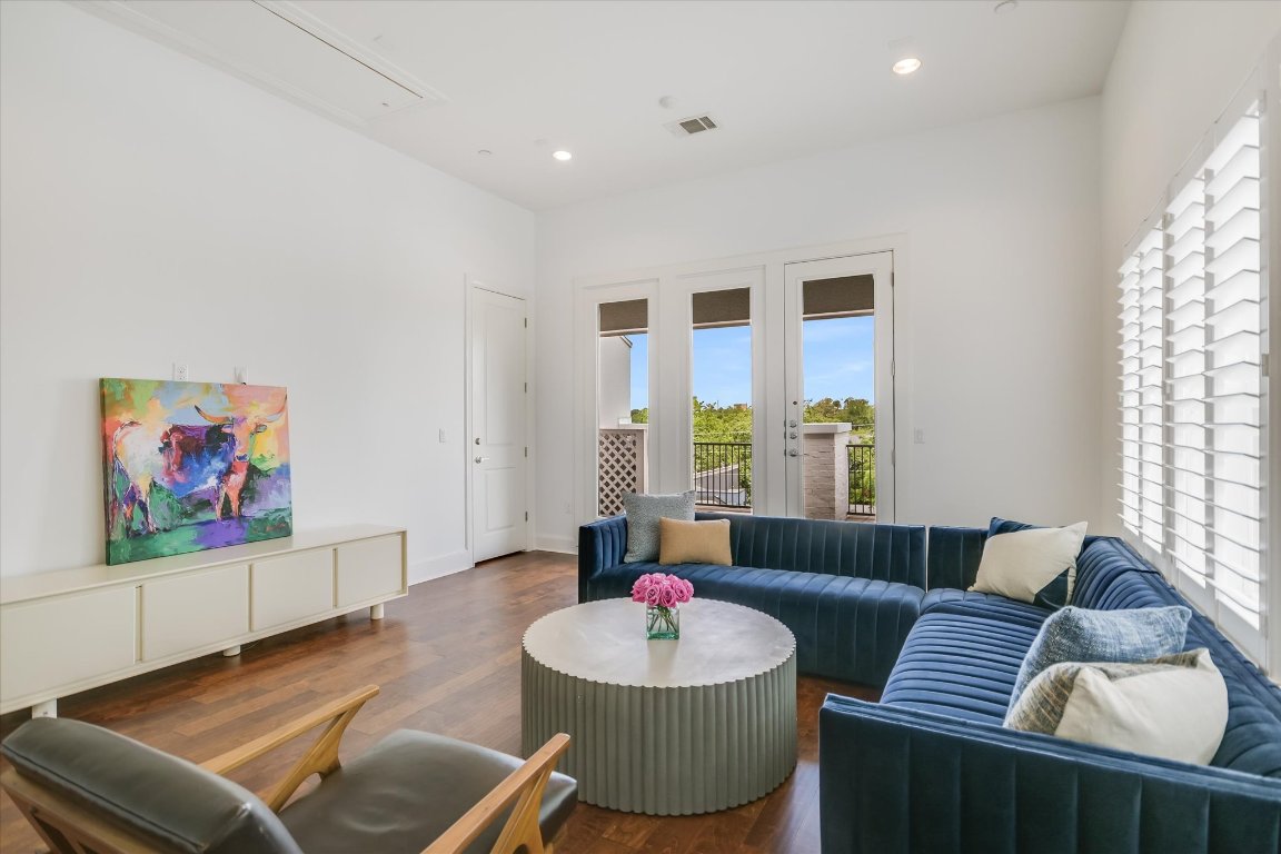 1023 Juniper Street Austin, TX 78702 - Photo 14 of 31 a living room with furniture and a large window