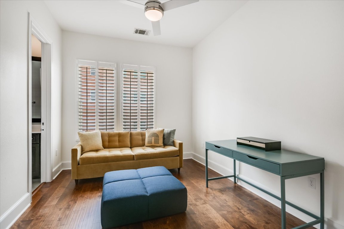1023 Juniper Street Austin, TX 78702 - Photo 20 of 31 a living room with furniture and a window