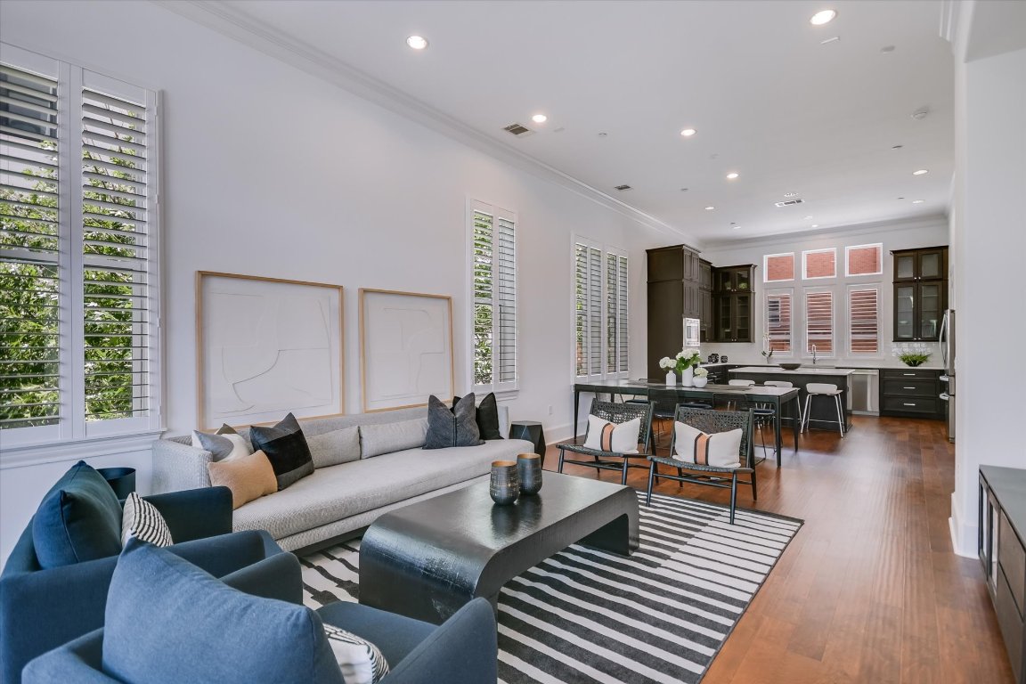 1023 Juniper Street Austin, TX 78702 - Photo 9 of 31 a living room with furniture and wooden floor