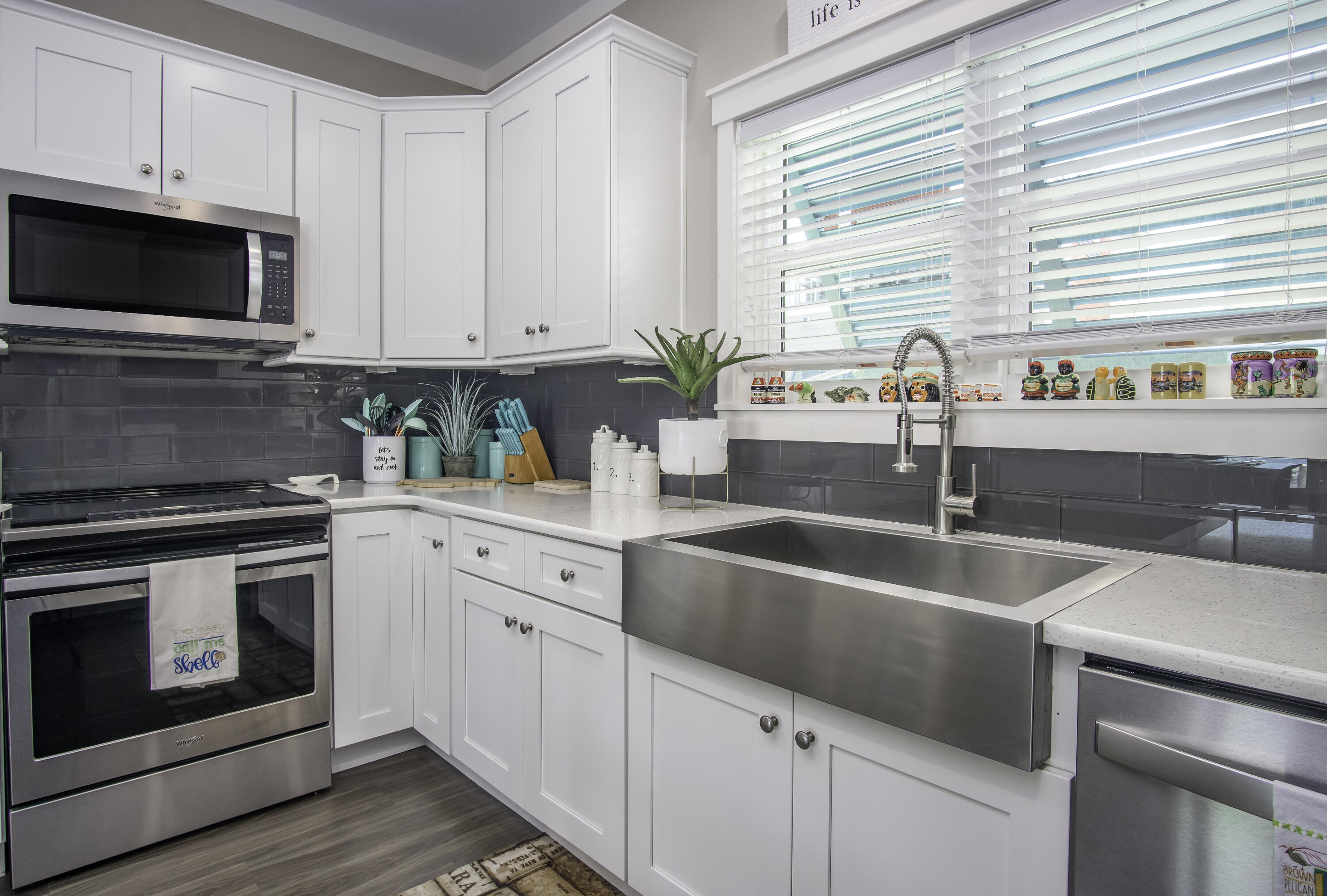 101 11th Street, Unit 11 Marathon, FL 33050 - Photo 12 of 67 a kitchen with a sink stove and microwave