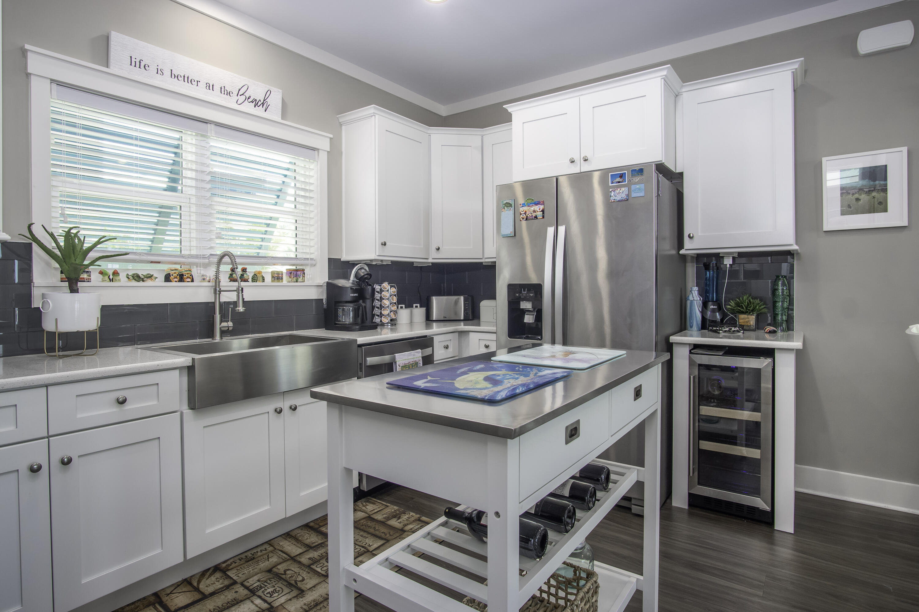 101 11th Street, Unit 11 Marathon, FL 33050 - Photo 13 of 67 a kitchen with stainless steel appliances a sink a stove a refrigerator and cabinets