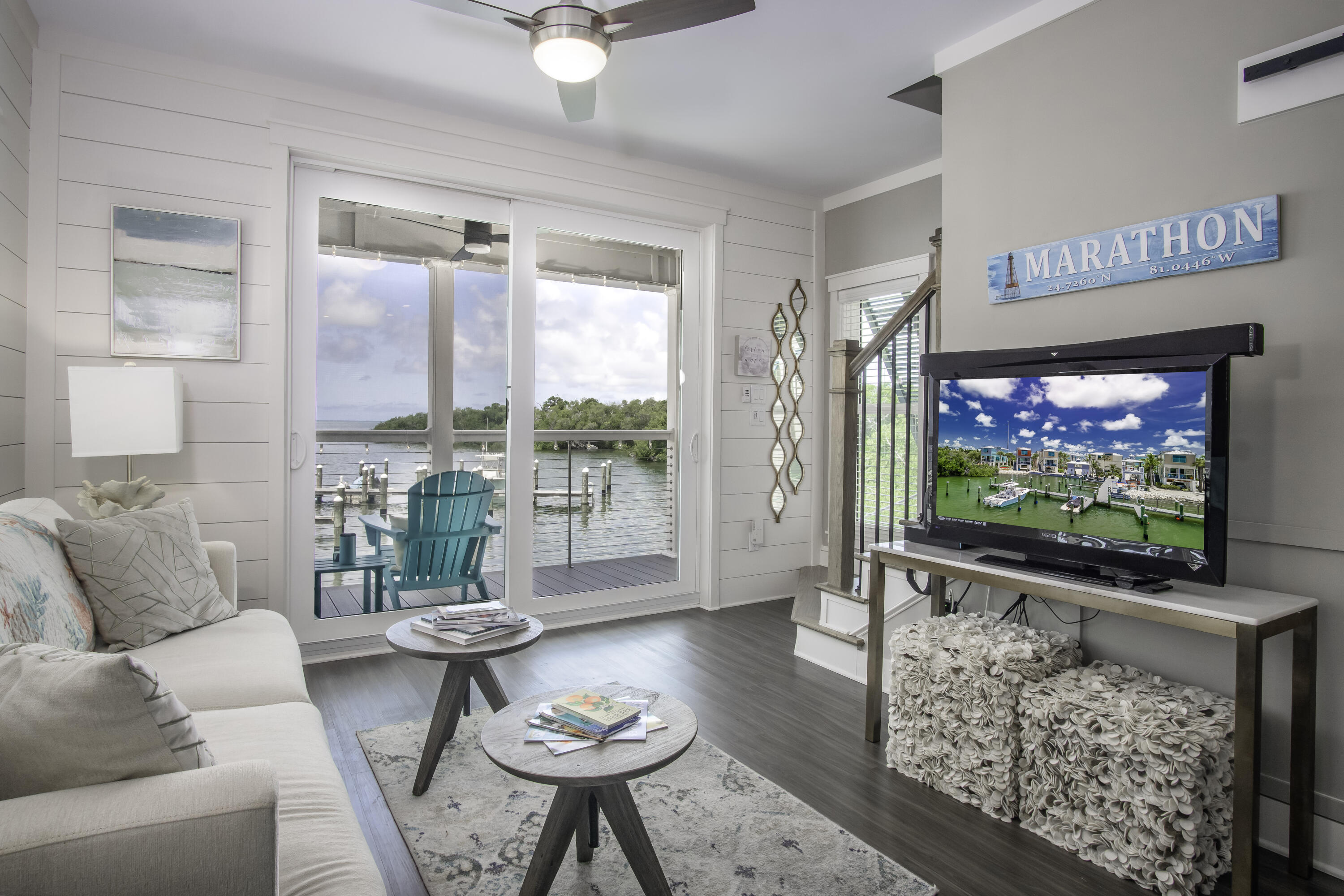 101 11th Street, Unit 11 Marathon, FL 33050 - Photo 15 of 67 a living room with furniture a rug and a flat screen tv