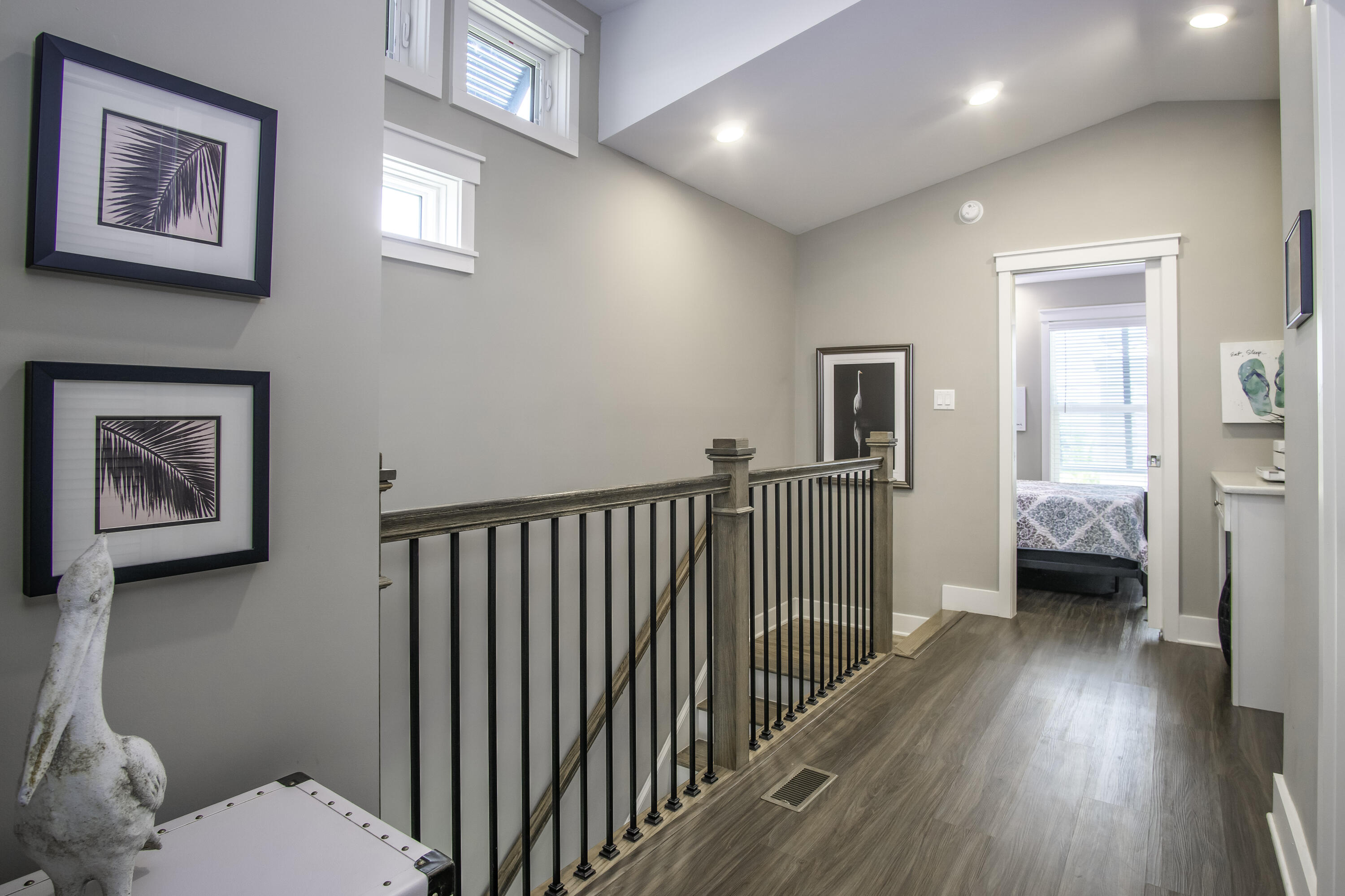 101 11th Street, Unit 11 Marathon, FL 33050 - Photo 24 of 67 a view of a hallway with wooden floor and a bedroom