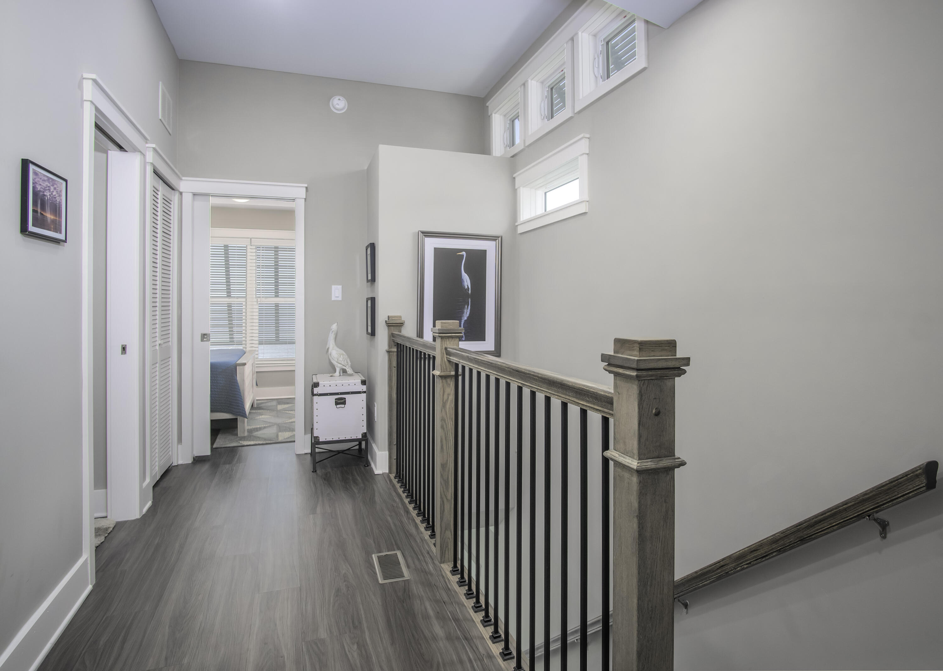 101 11th Street, Unit 11 Marathon, FL 33050 - Photo 25 of 67 a view of a hallway with wooden floor and a bathroom