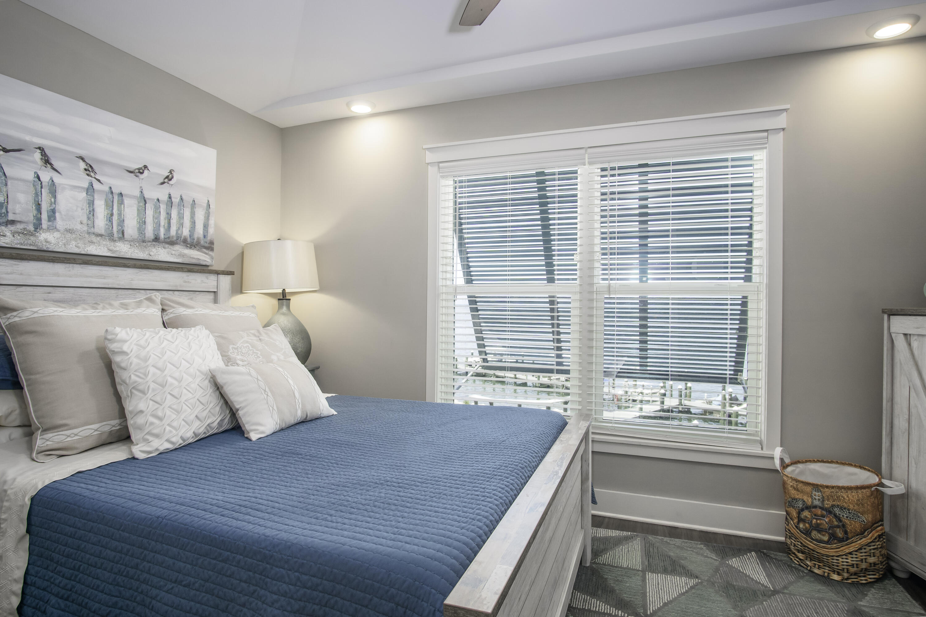 101 11th Street, Unit 11 Marathon, FL 33050 - Photo 29 of 67 a bedroom with a bed and a window
