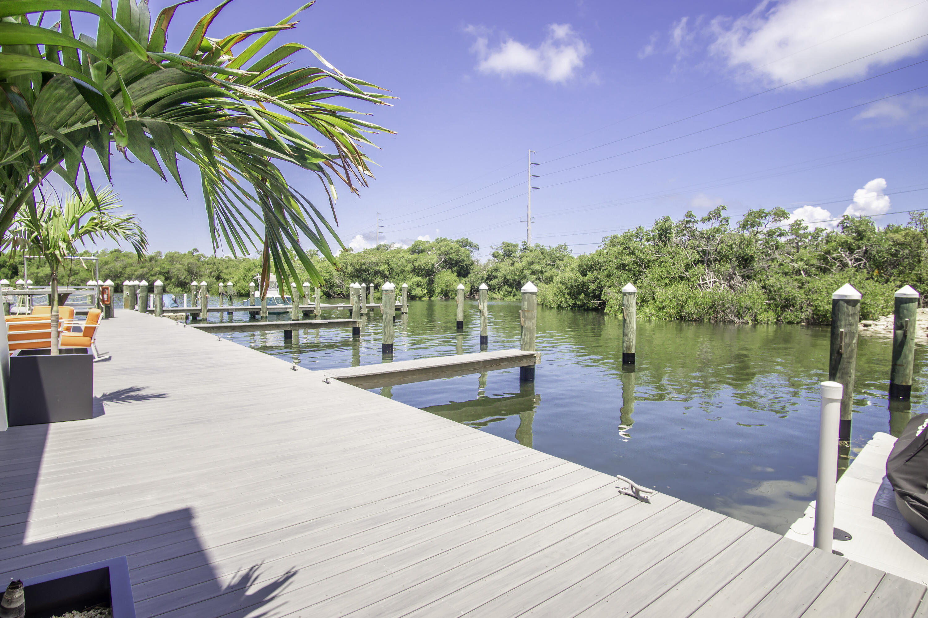 101 11th Street, Unit 11 Marathon, FL 33050 - Photo 43 of 67 a view of outdoor space with swimming pool and lake view
