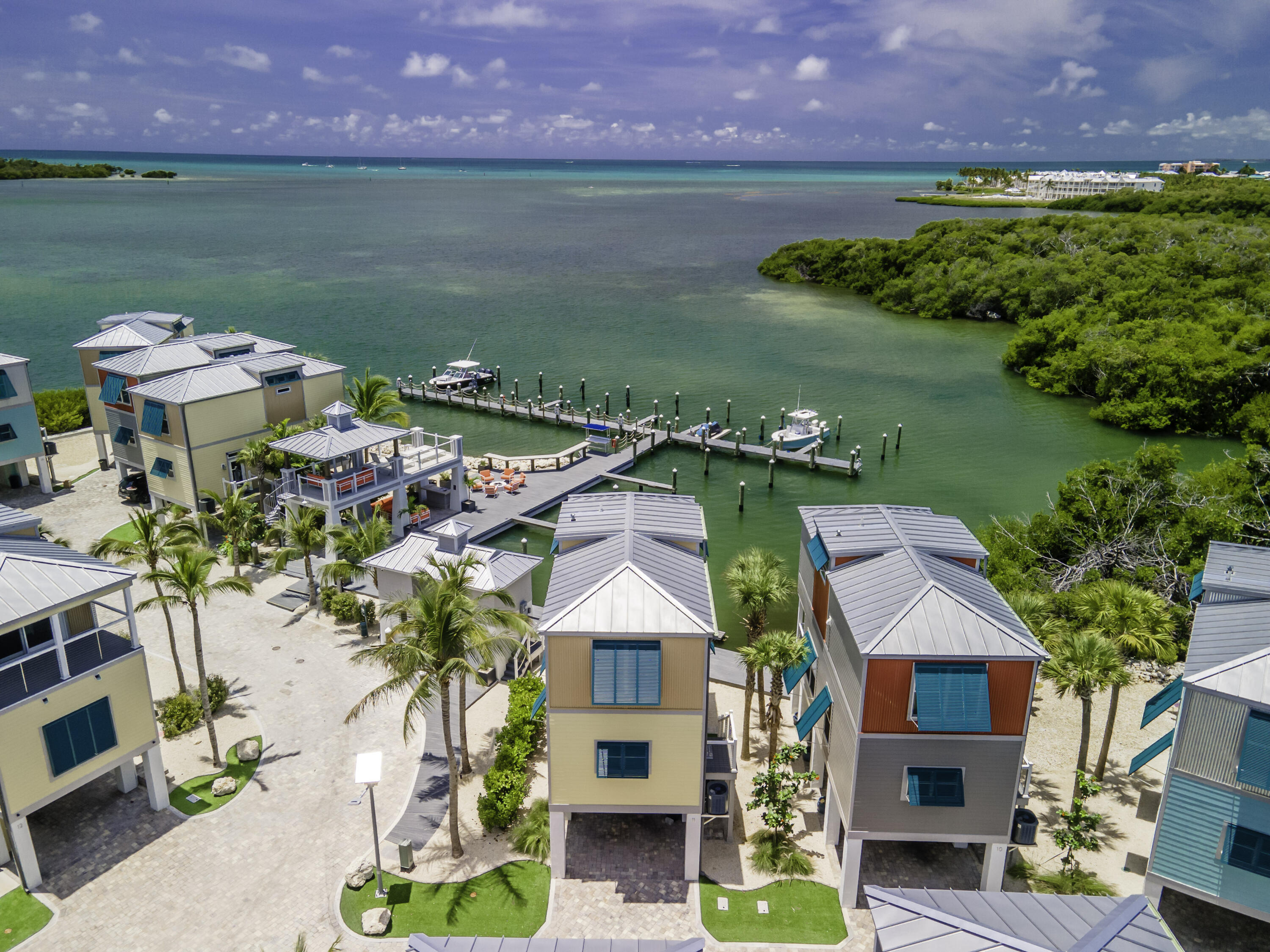101 11th Street, Unit 11 Marathon, FL 33050 - Photo 5 of 67 an aerial view of a house with a garden and lake view