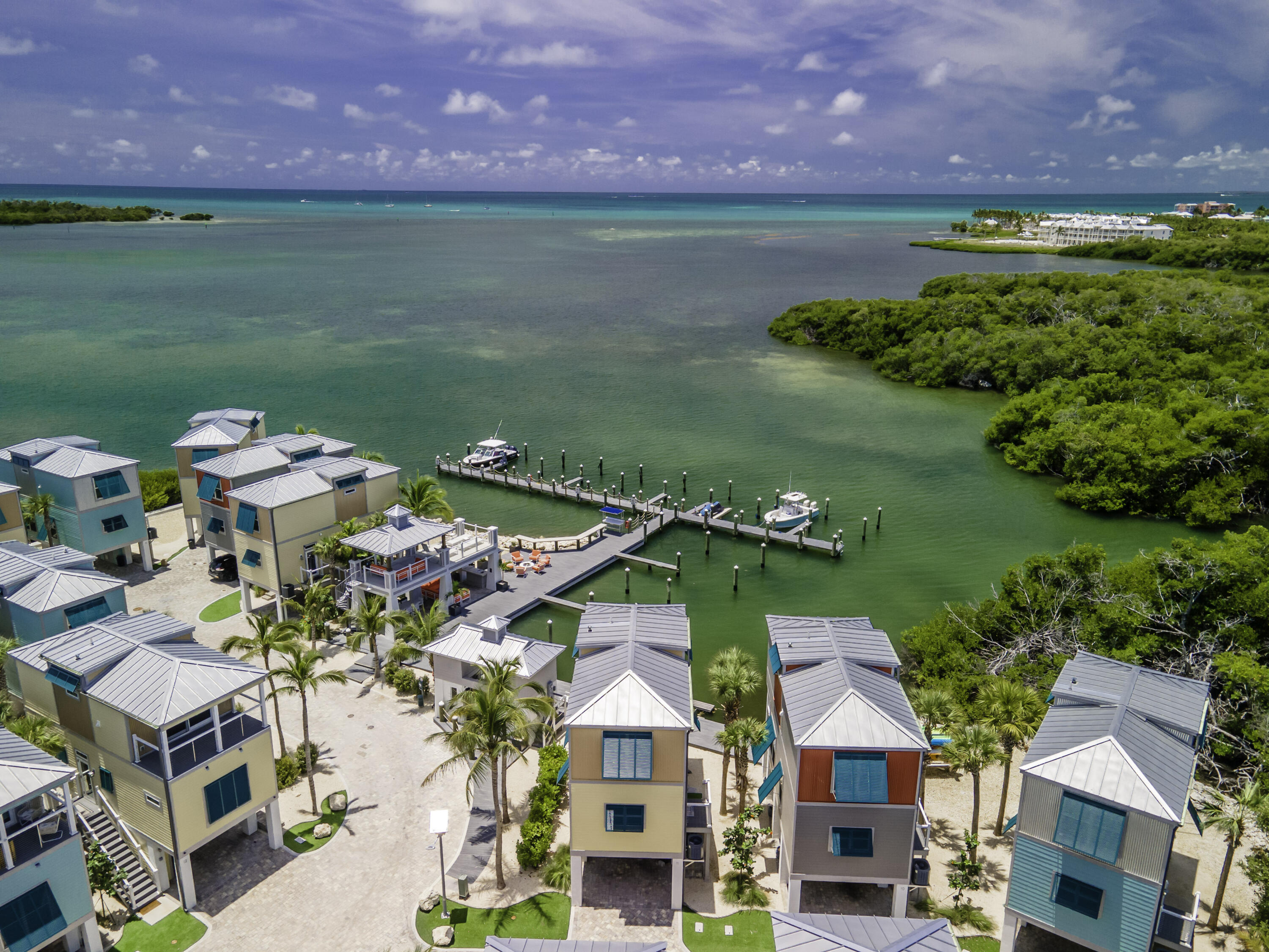 101 11th Street, Unit 11 Marathon, FL 33050 - Photo 57 of 67 an aerial view of a house with a garden and lake view