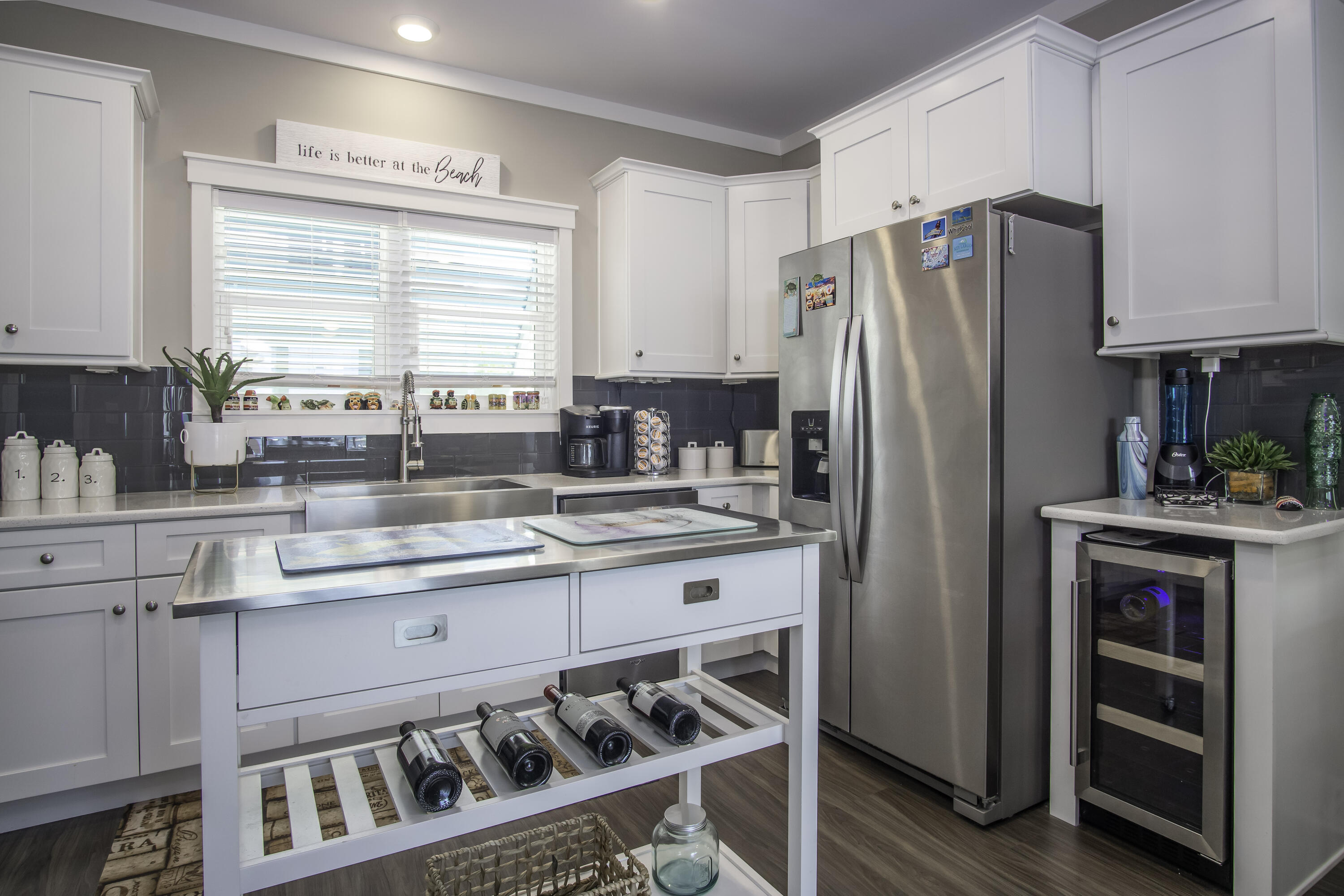 101 11th Street, Unit 11 Marathon, FL 33050 - Photo 10 of 67 a kitchen with stainless steel appliances a sink cabinets and a refrigerator