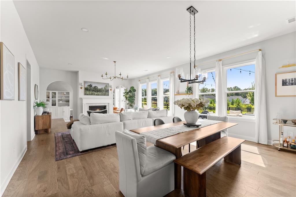 3675 Andover Street Cumming, GA 30028 - Photo 17 of 52 a living room with furniture and a large window