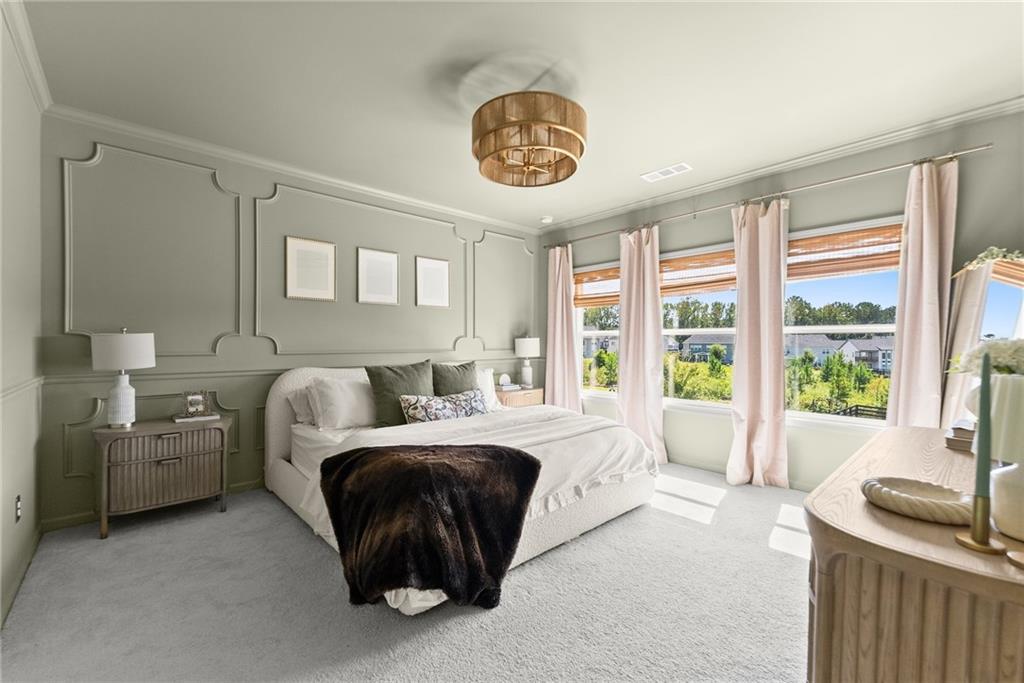 3675 Andover Street Cumming, GA 30028 - Photo 26 of 52 a bedroom with a bed and a large window