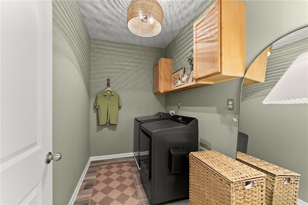 3675 Andover Street Cumming, GA 30028 - Photo 40 of 52 a bathroom with a sink and a mirror