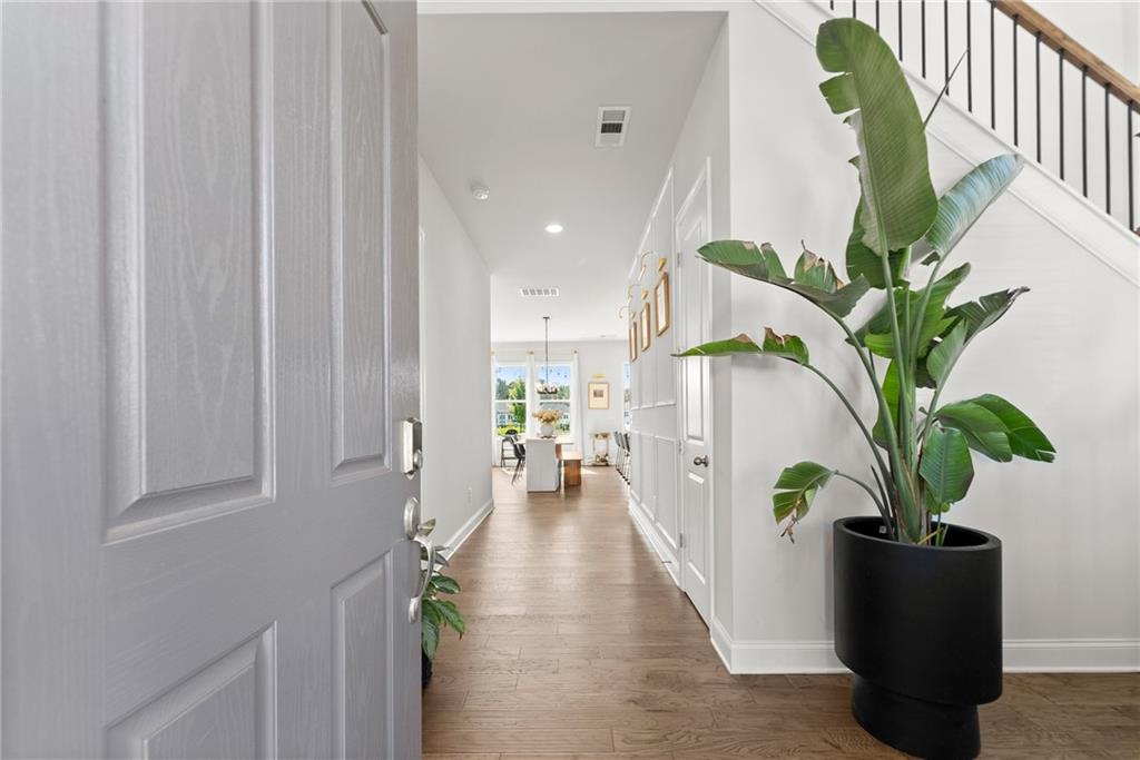 3675 Andover Street Cumming, GA 30028 - Photo 4 of 52 a living room with furniture and a potted plant