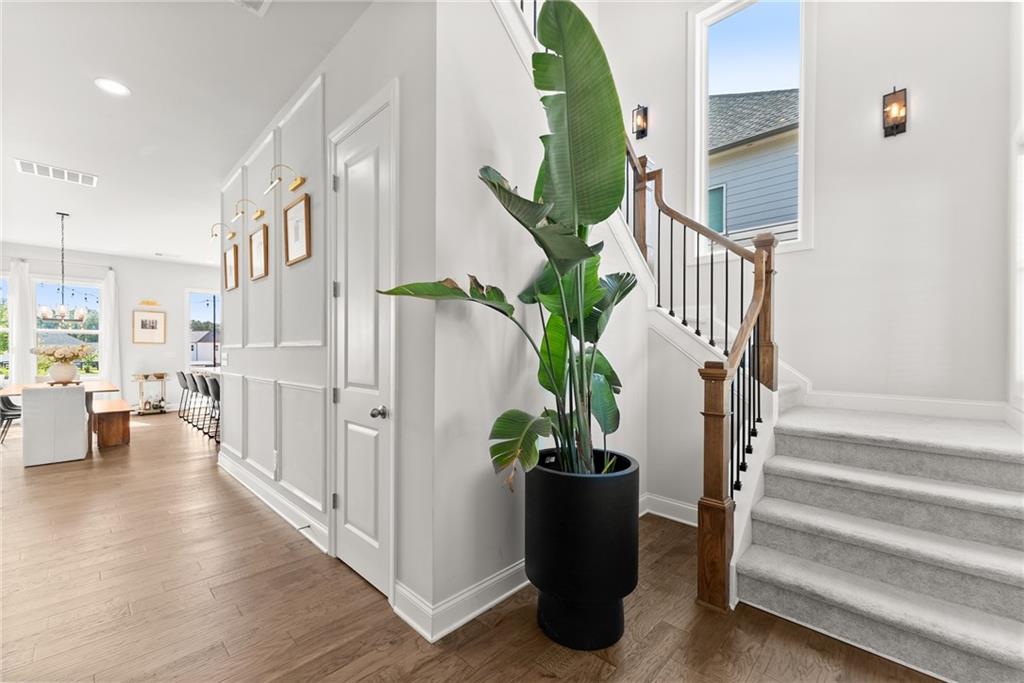 3675 Andover Street Cumming, GA 30028 - Photo 5 of 52 a view of entryway and hall with wooden floor