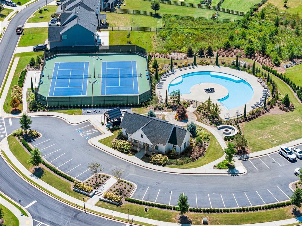 3675 Andover Street Cumming, GA 30028 - Photo 52 of 52 an aerial view of a house with swimming pool and patio