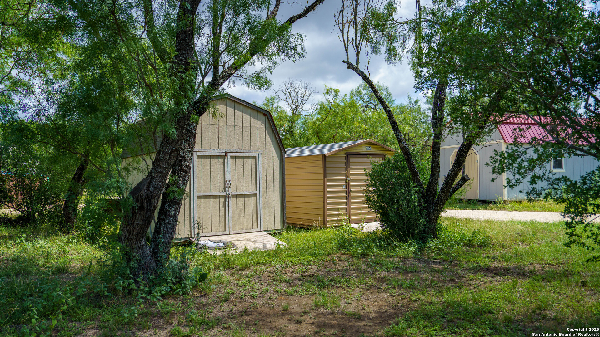 1231 B & R Road Vanderpool, TX 78885 - Photo 19 of 26 a house with lots of trees