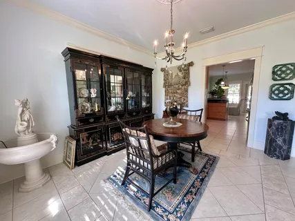 a kitchen with stainless steel appliances granite countertop a sink counter space and a window