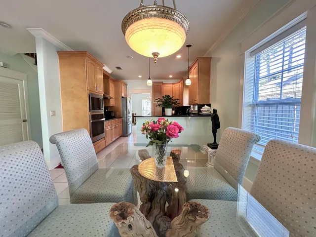 a view of a dining room with furniture window and outside view