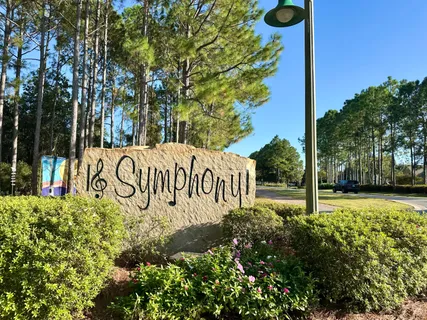 a sign that is next to a road