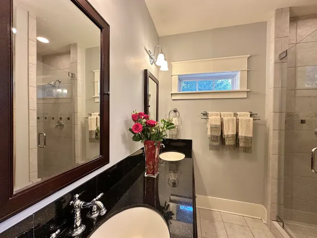 a building outdoor space with patio furniture and potted plants