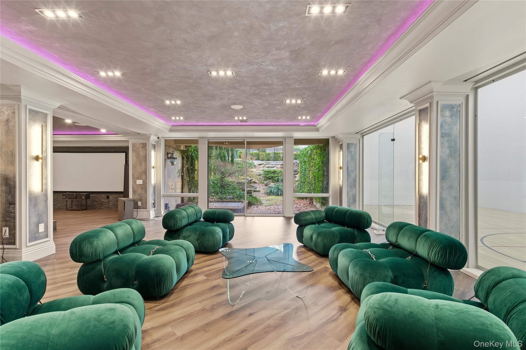 55 Coves Run Syosset, NY 11791 - Photo 43 of 50 a living room with furniture and a large window