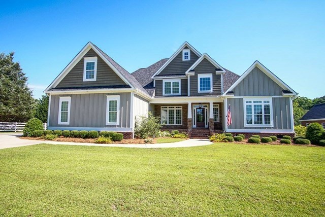 112 Pate Road Macon, GA 31210 - Photo 1 of 24 a front view of a house with a yard