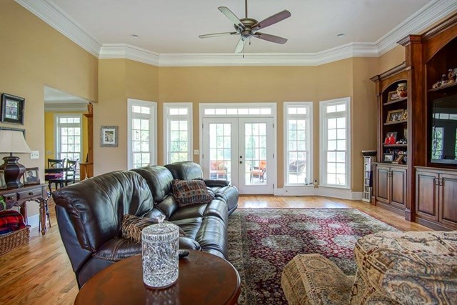 112 Pate Road Macon, GA 31210 - Photo 11 of 24 a living room with furniture large window and flat screen tv