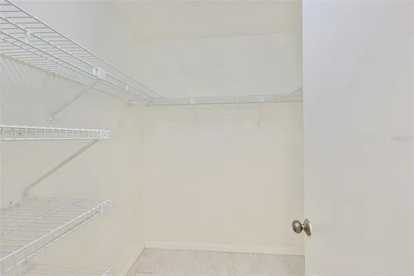 a bathroom with a toilet sink and shower