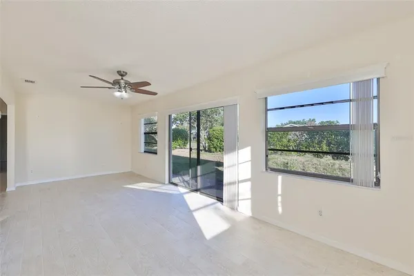 a view of a room with a large window