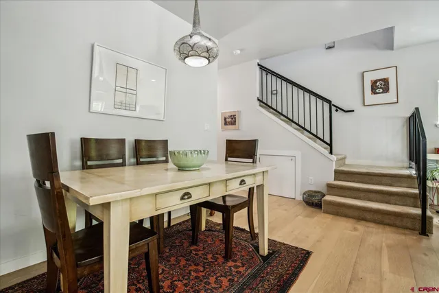 a view of a dining room with furniture