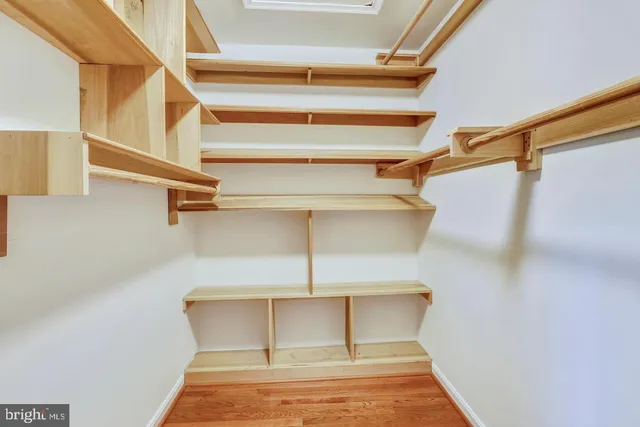 a view of a room with racks on the wall