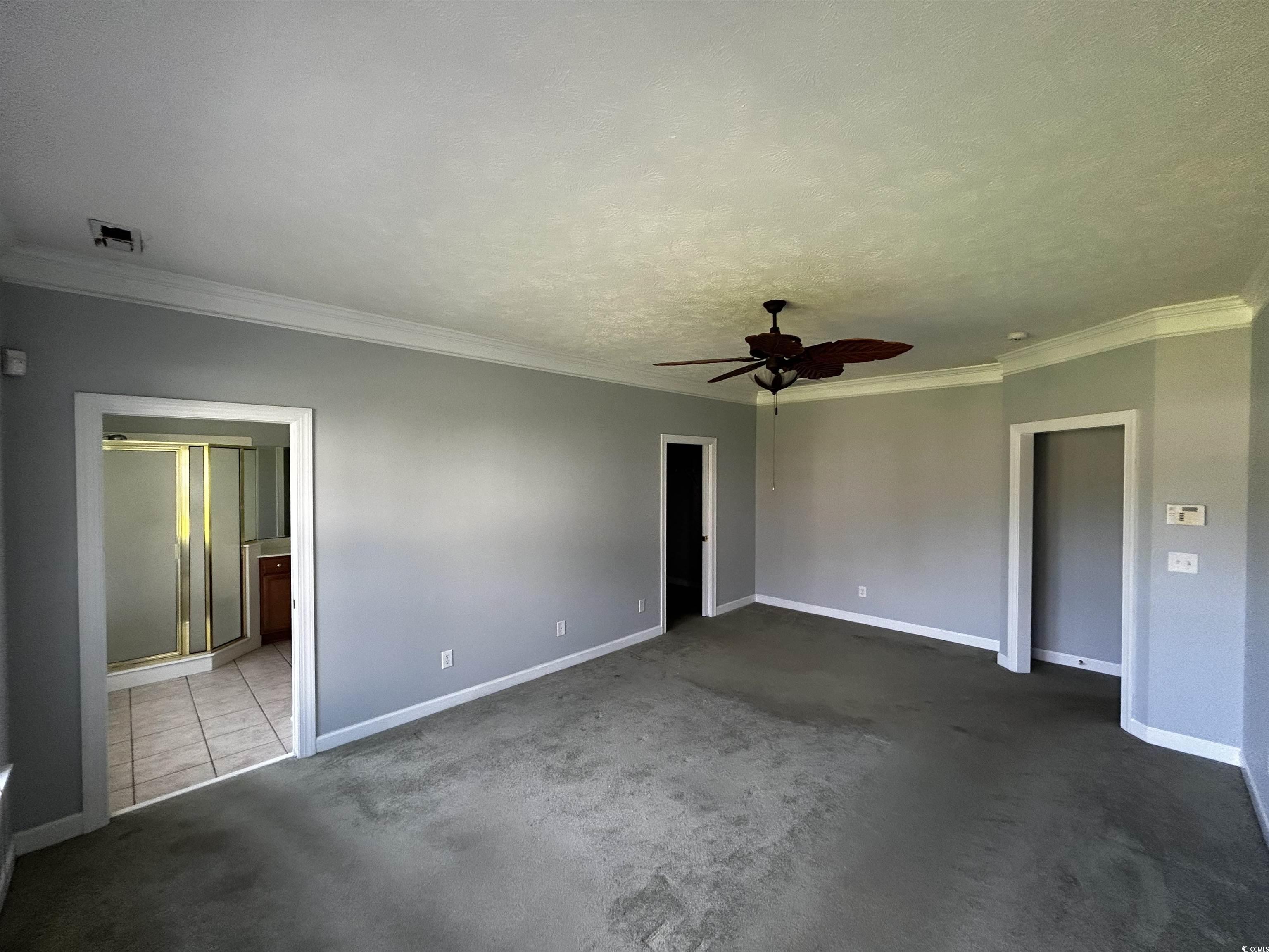 1300 Manchester Court Murrells Inlet, SC 29576 - Photo 19 of 40 Unfurnished bedroom featuring ceiling fan, tile fl
