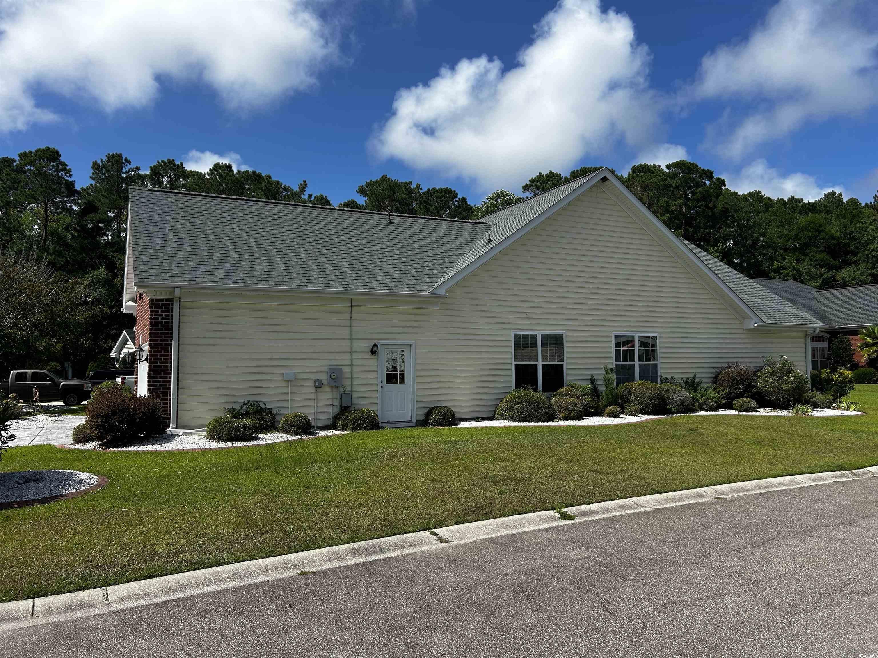 1300 Manchester Court Murrells Inlet, SC 29576 - Photo 2 of 40 View of front of property featuring a front yard
