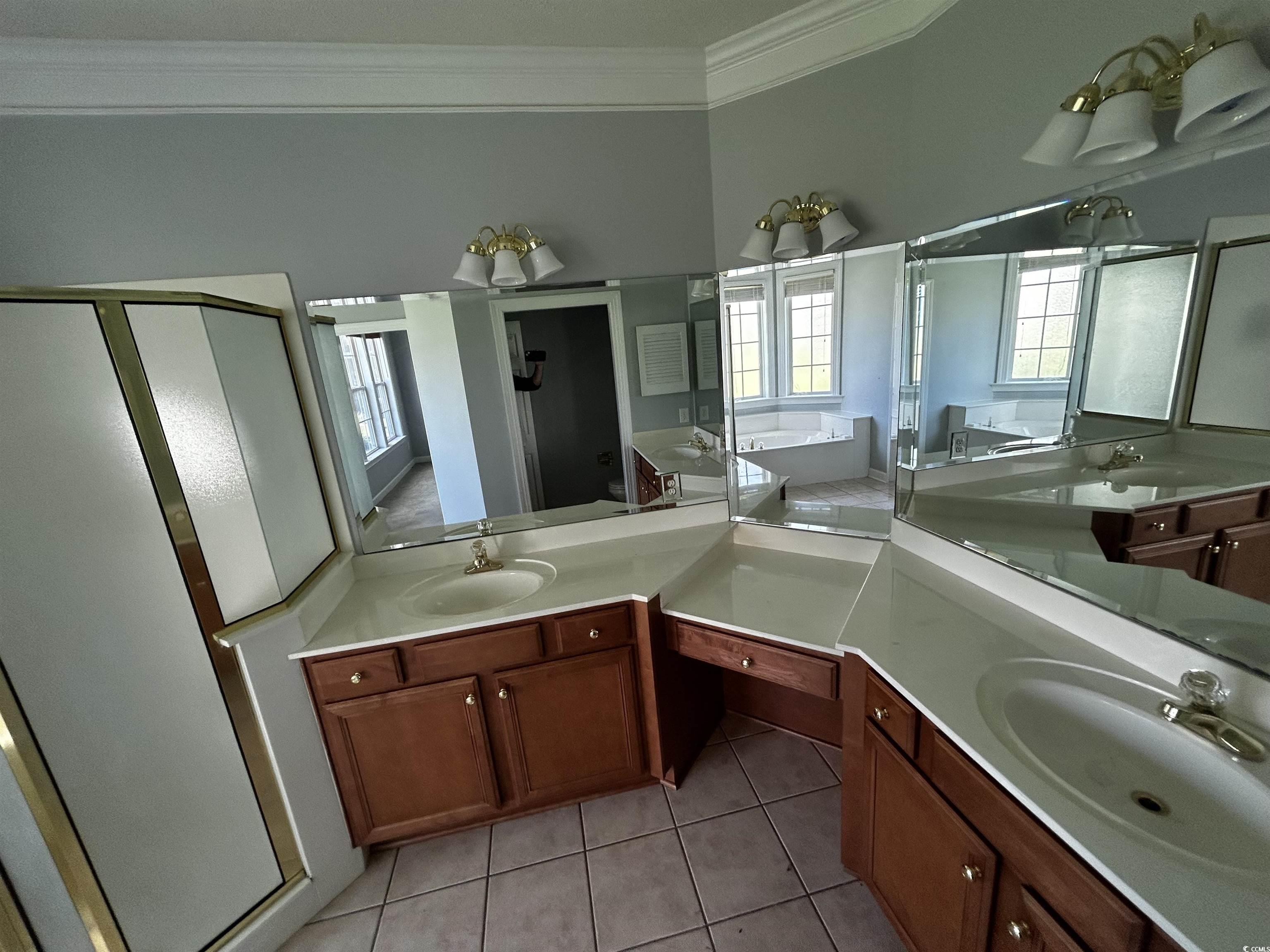 1300 Manchester Court Murrells Inlet, SC 29576 - Photo 26 of 40 Bathroom featuring tile floors, large vanity, crow