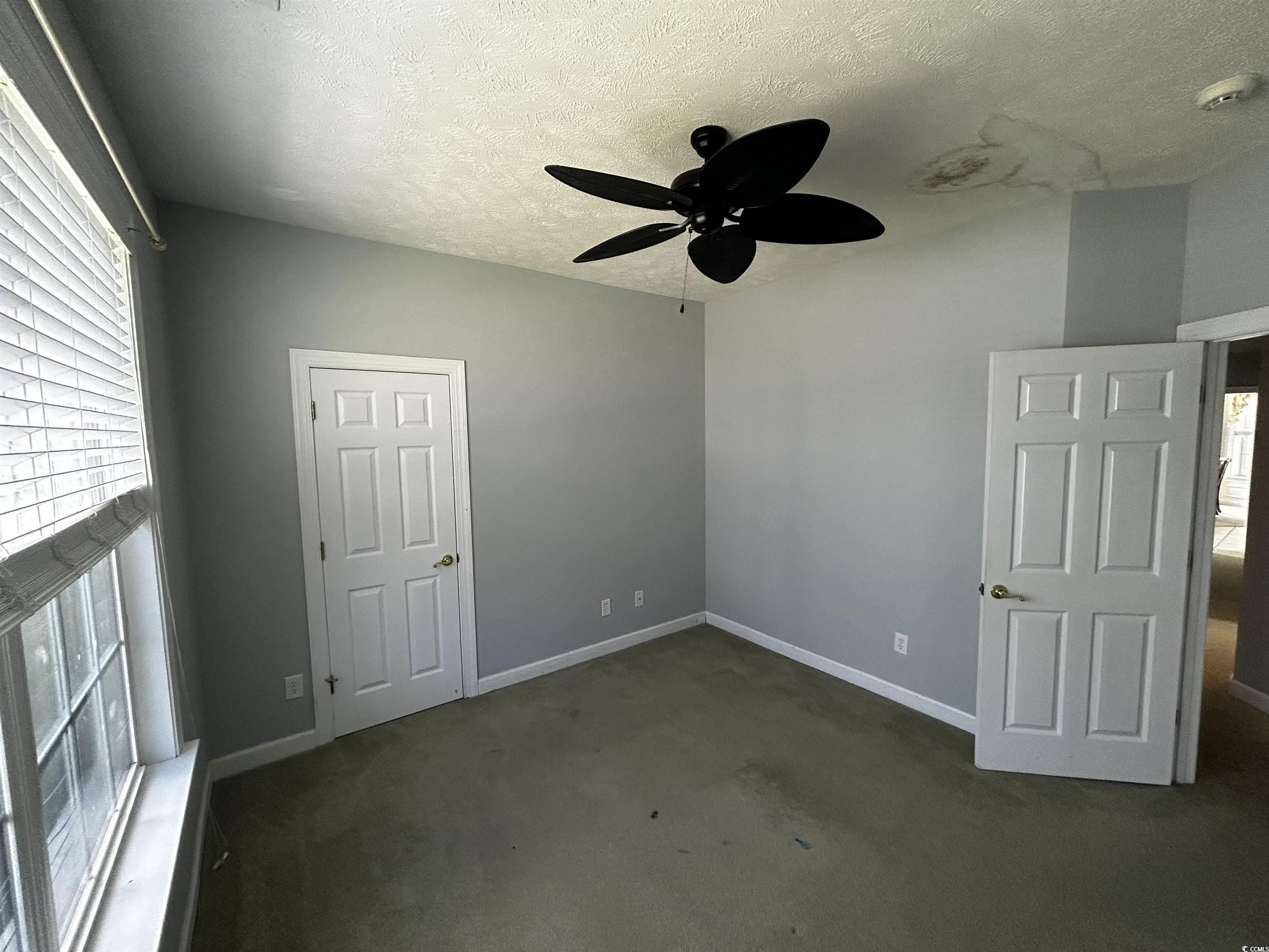 1300 Manchester Court Murrells Inlet, SC 29576 - Photo 32 of 40 Unfurnished room with a healthy amount of sunlight