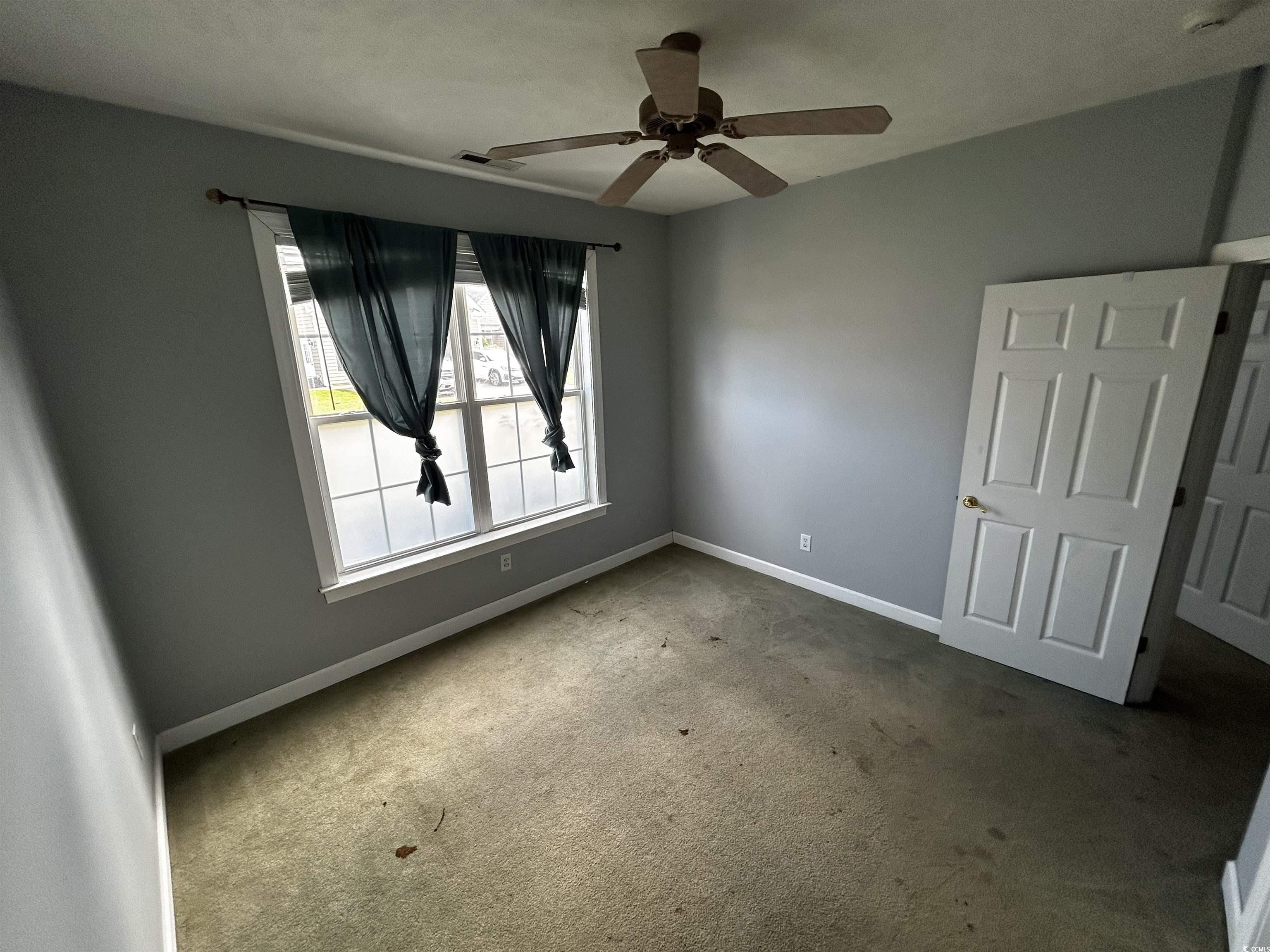 1300 Manchester Court Murrells Inlet, SC 29576 - Photo 35 of 40 Unfurnished bedroom featuring carpet and ceiling f