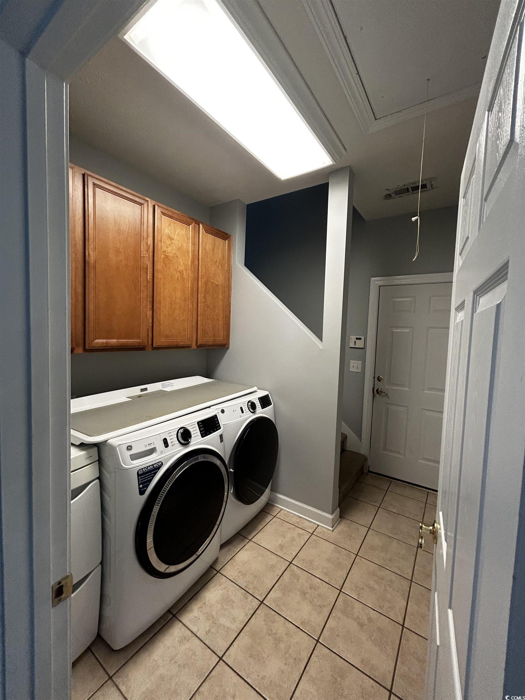 1300 Manchester Court Murrells Inlet, SC 29576 - Photo 36 of 40 Clothes washing area featuring cabinets, washer an
