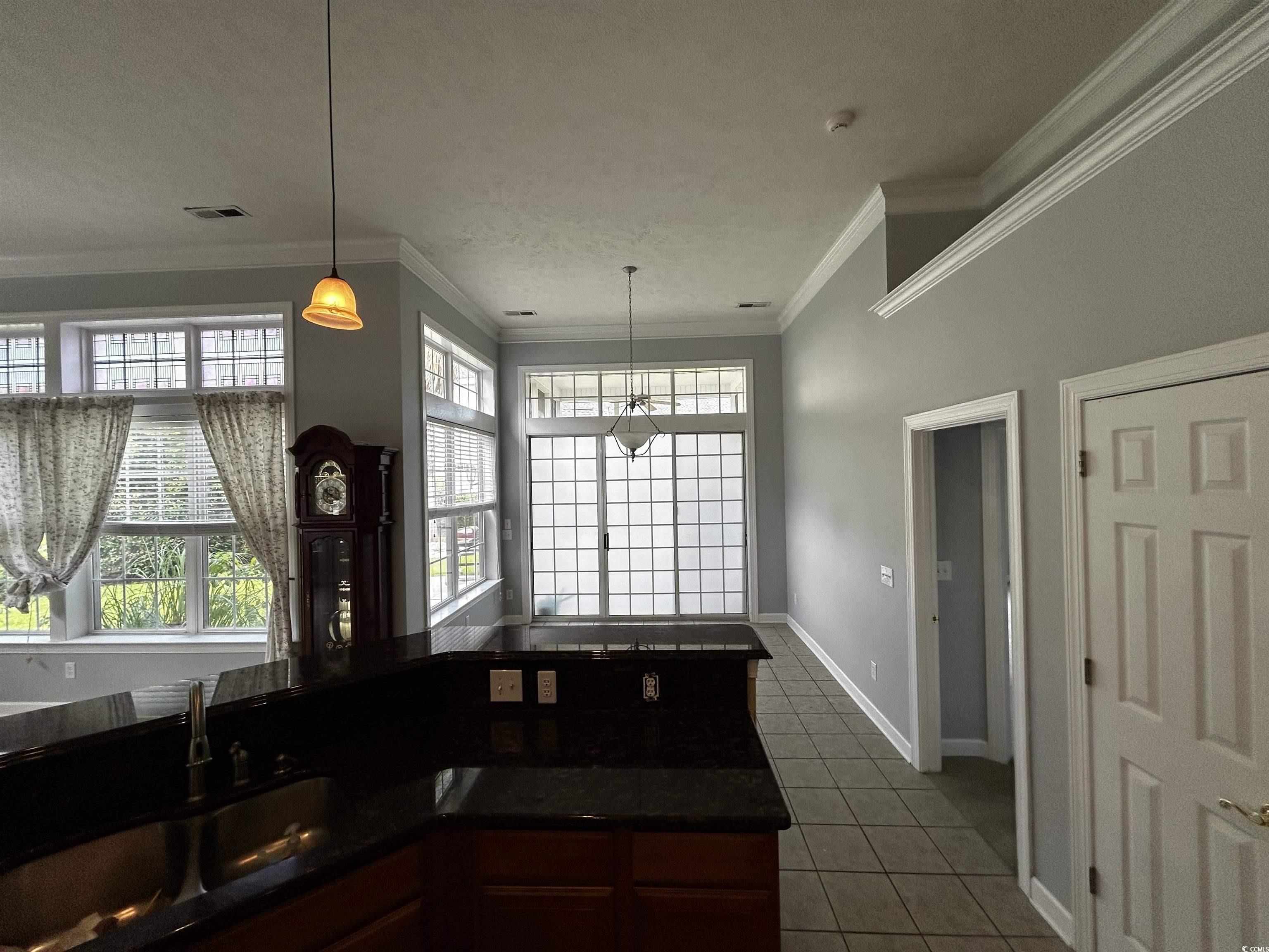 1300 Manchester Court Murrells Inlet, SC 29576 - Photo 9 of 40 Kitchen featuring decorative light fixtures, sink,
