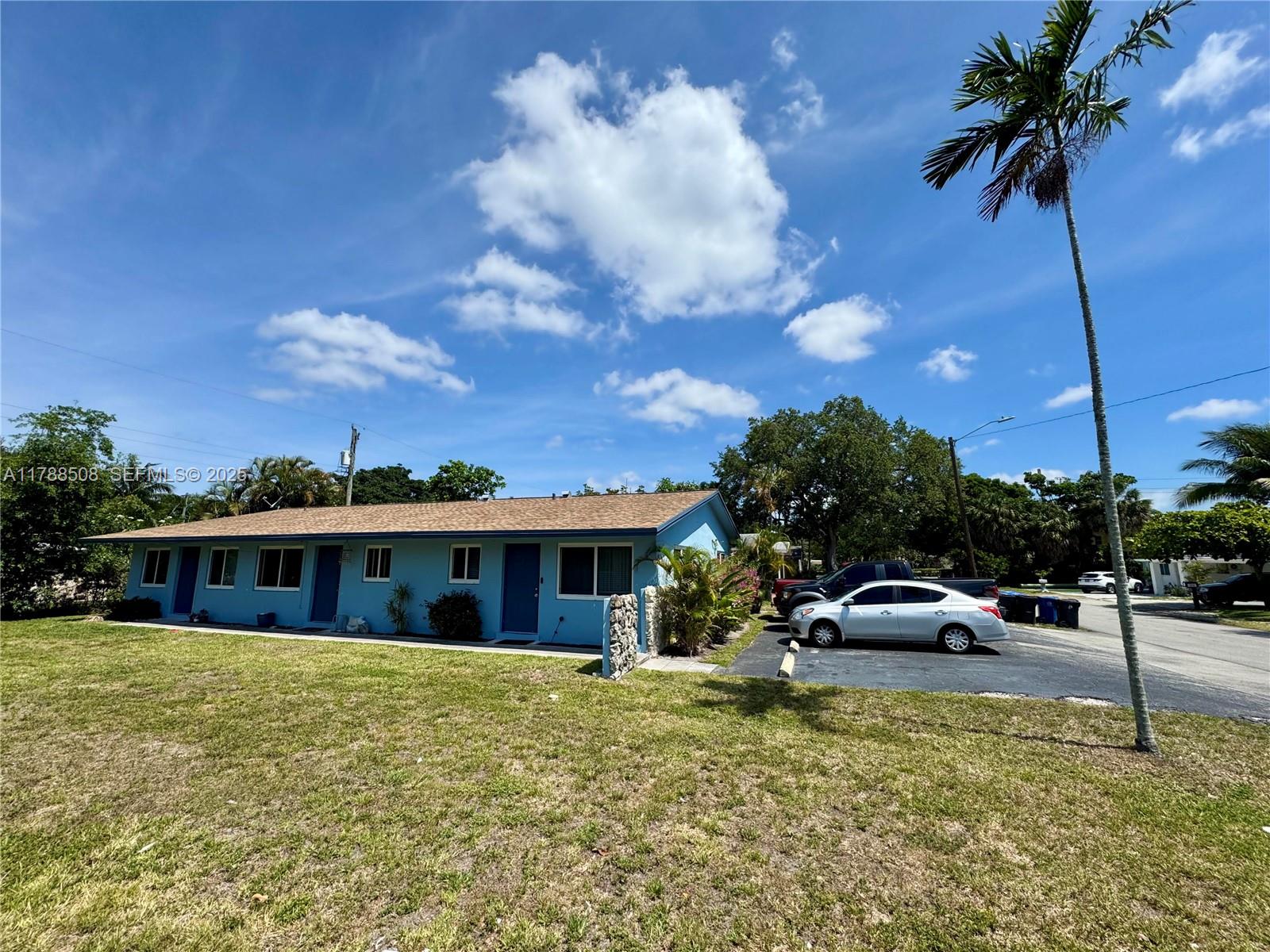 2631 Southwest 13th Avenue Fort Lauderdale, FL 33315 - Photo 20 of 24 a front view of a house with garden