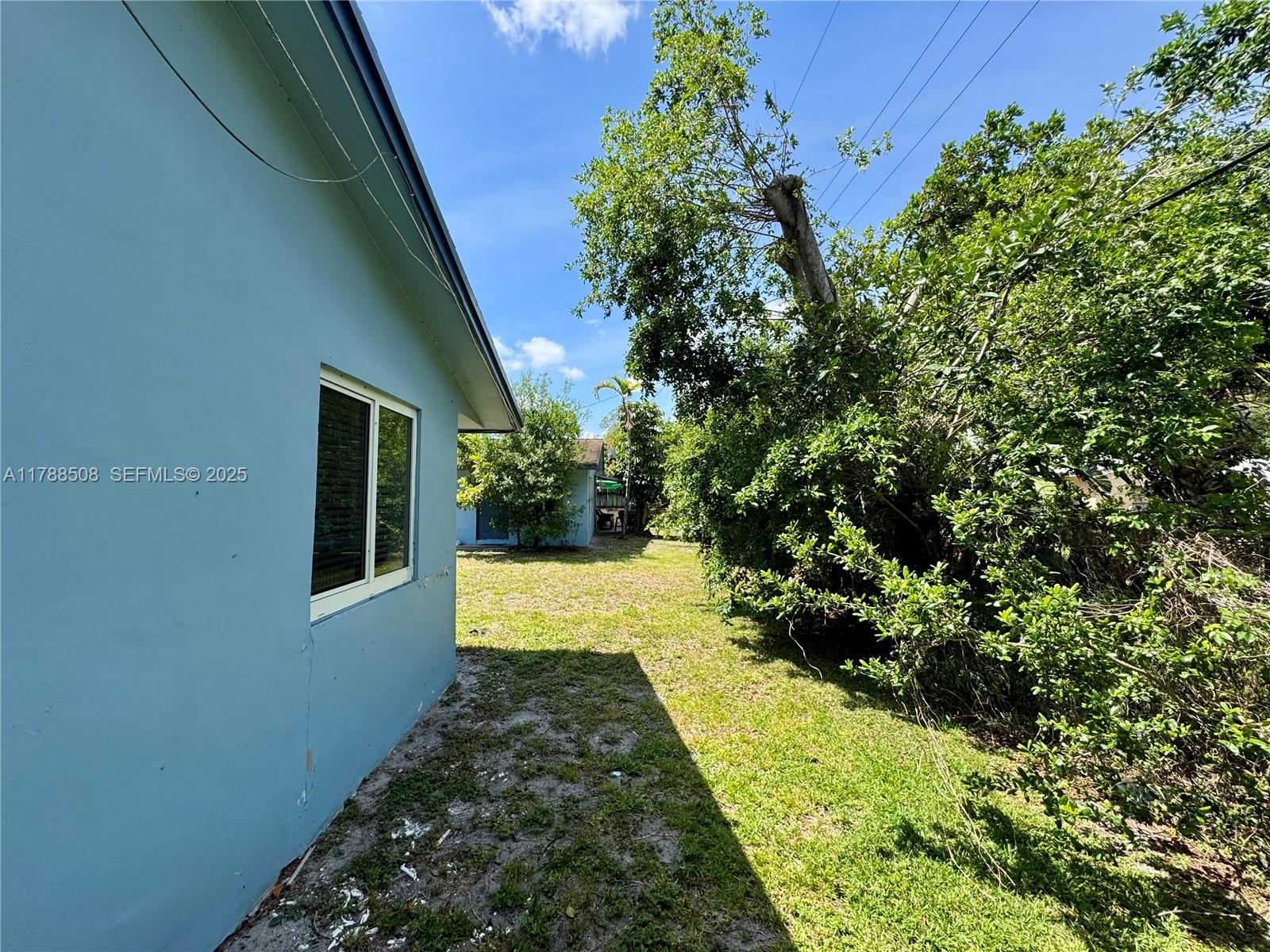 2631 Southwest 13th Avenue Fort Lauderdale, FL 33315 - Photo 23 of 24 a view of a yard with plants