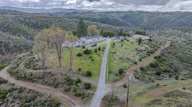 a kitchen with cabinets oven and a sink