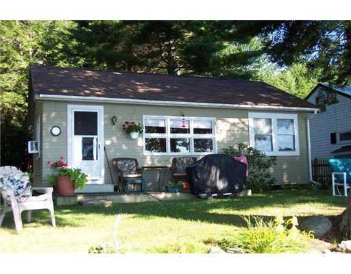 130 Rancourt Lane Burnham, ME 04922 - Photo 1 of 13 Exterior Front. Lake side of home
