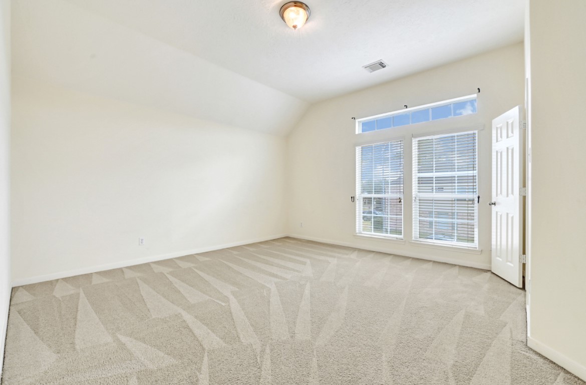 3306 Colleville Sur Mer Lane Spring, TX 77388 - Photo 34 of 40 a view of an empty room with a window