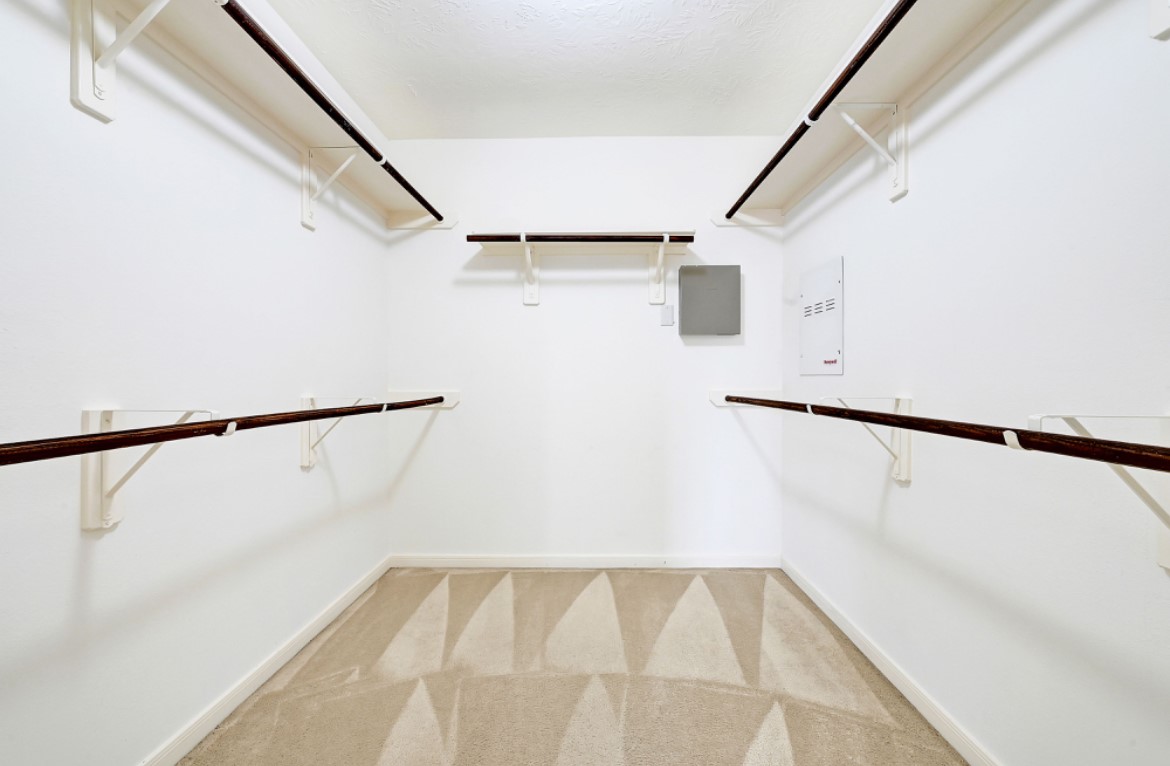 3306 Colleville Sur Mer Lane Spring, TX 77388 - Photo 35 of 40 a view of walk in closet with empty racks