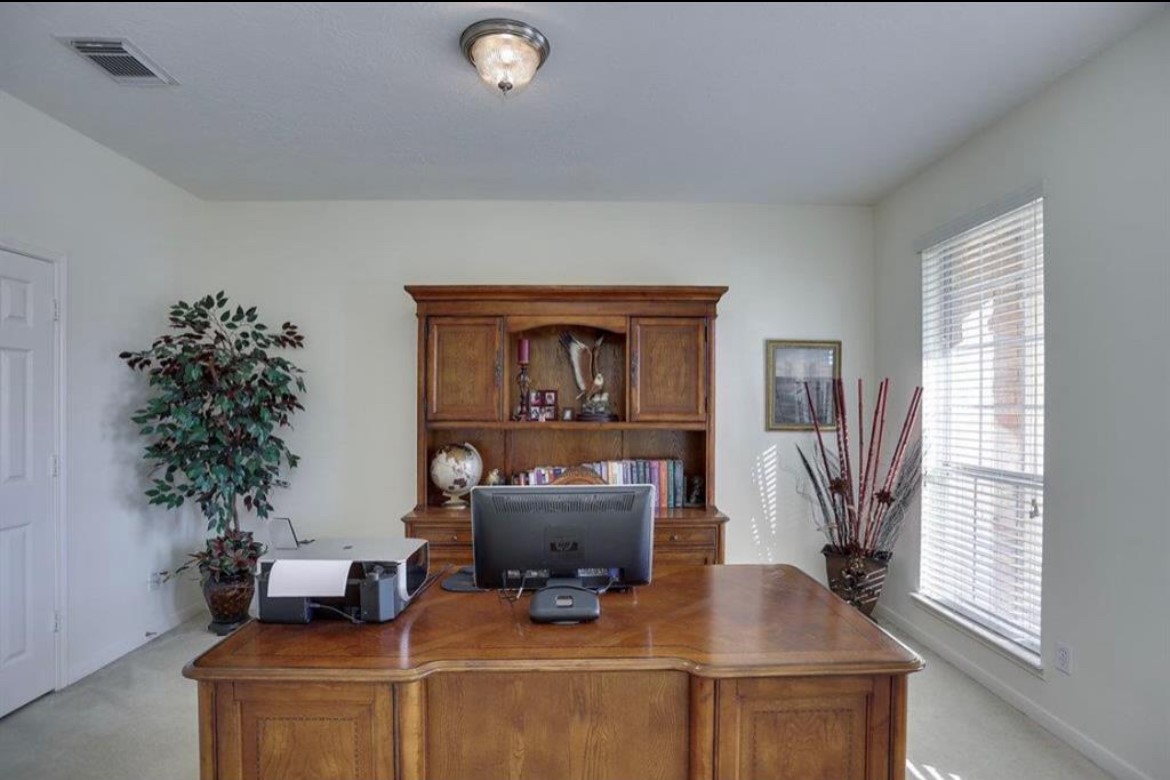 3306 Colleville Sur Mer Lane Spring, TX 77388 - Photo 5 of 40 a living room with furniture and a potted plant