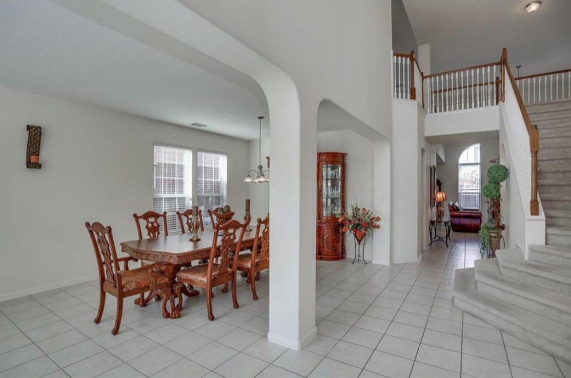 3306 Colleville Sur Mer Lane Spring, TX 77388 - Photo 7 of 40 a view of a dining room with furniture