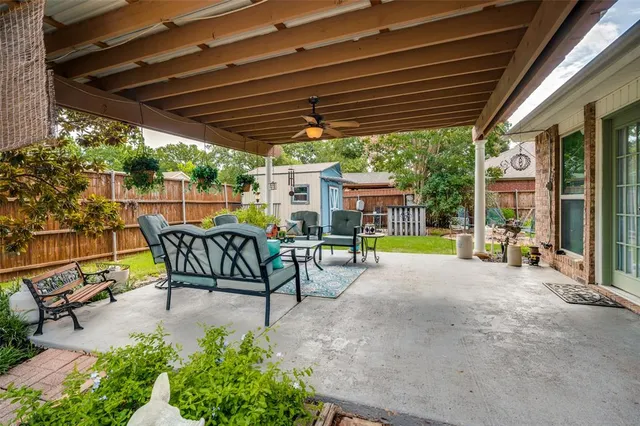 a view of a swimming pool with a patio