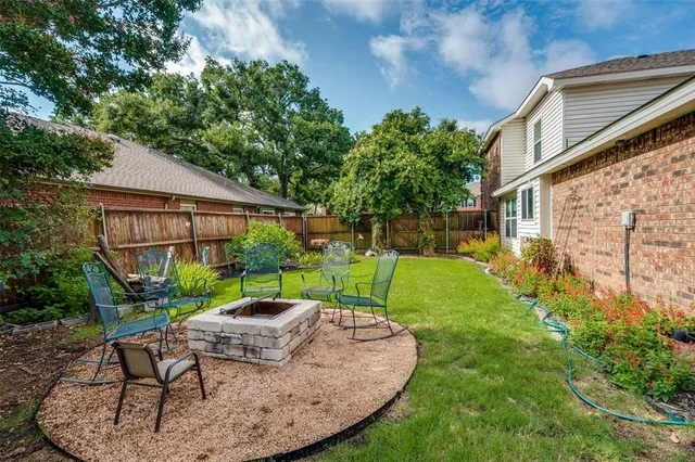 a garden view with a seating space