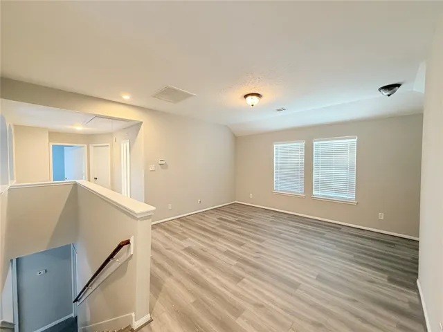 a bathroom with a sink and shower